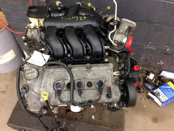 Engine assembly photographed inside the shop